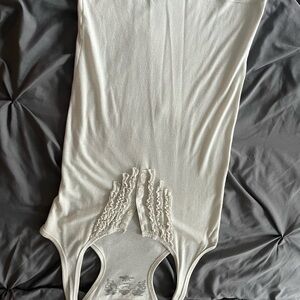 White Sleeveless Top with Ruffle Detail